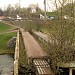 Пешеходный мост, совмещённый с трубопроводом через р. Сходню в городе Москва