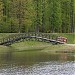 Декоративный пешеходный мост к острову на Бабаевском пруду в городе Москва
