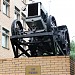 Монумент «Слава труженикам села» с трактором СХТЗ 15/30 на постаменте в городе Москва