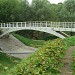 Арочный пешеходный мост через реку Раменку в городе Москва