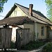 Деревянный дом на территории Спасского храма в городе Долгопрудный