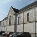 Chapelle de l'hôpital et sa galerie d'accès dans la ville de Caen