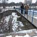 Пешеходный мост через водосток Школьного пруда в городе Москва