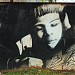 Снесённая стена с художественно выполненными граффити в городе Москва