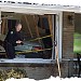 House hit by cars in two separate incidents in Feb 2009 in Toronto, Ontario city