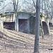 Полуразрушенный декоративный грот-мост – памятник архитектуры в городе Москва