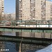Демонтированный пешеходный мост через заболоченную долину реки Яузы в городе Мытищи