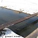 Мост теплотрассы через реку Яузу в городе Мытищи