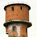 Старая кирпичная водонапорная башня в городе Москва