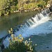Разрушенная плотина Тишинского водохранилища в городе Риддер