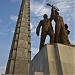 A statue of a worker, a peasant woman and a 