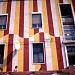 Old building painted with bright colors in Tirana city