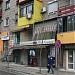 Partly painted building in Tirana city