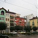 Soviet style red building in Tirana city