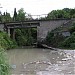 Железнодорожный мост через реку Вишнёвку и мемориальная доска транспорта «Азов» в городе Сочи