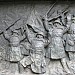 Temple lanterns with bas-reliefs depicting scenes from war history in Tokyo city