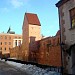 Reconstructed fragment of the city wall and Ramer tower on Torņa street