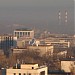 Здание с большими спутниковыми антеннами в городе Алматы