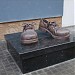 Памятник стоптанным ботинкам в городе Киев