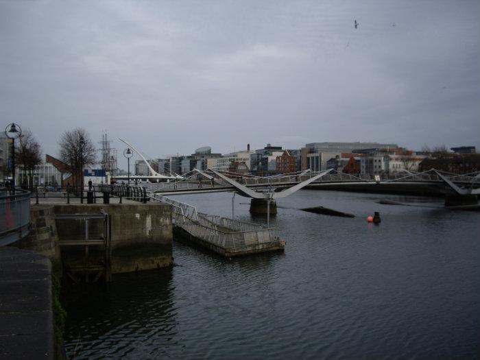 An accordion player busking on the Sean O Casey bridge with the