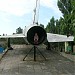 Самолёт Су-9 на постаменте в городе Геническая Горка