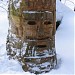 Вырезанное на дереве лицо старика в городе Москва