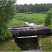 Трубопроводная эстакада теплотрассы через реку Чурилиху в городе Москва