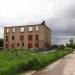 Недостроенный трехэтажный кирпичный дом в городе Долгопрудный