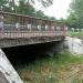 Bridge across drainage channel