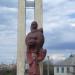 Statue of woman with bread and salt