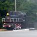 Old steam locomotive with museum in a carriage. in Melitopol city