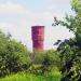 Красная водонапорная башня в городе Выборг