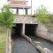 Сток воды с плотины в городе Сысерть