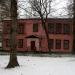 Реконструированное историческое здание бывшей фабричной школы в городе Москва