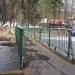 Пешеходный мост через пруд в городе Нахабино
