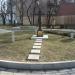 Memorial cross at the site where earlier was located the church of The Three Hierarchs