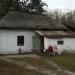 Старая хата под соломенной крышей в городе Обуховка