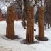 Деревянные скульптуры князя, купца и гусляра в городе Волоколамск