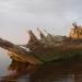 Затонувшая деревянная шхуна в городе Архангельск