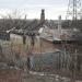 Разрушенные и сгоревшие дома в городе Луганск