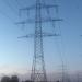 Anlage 7520, Mast 66 - ein 380 kV-Freileitungsmast unter dessen Beinen ein Feldweg hindurchführt