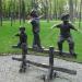 Скульптура трёх мальчишек на заборе в городе Харьков