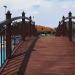 Pedestrian bridge over swimming pool