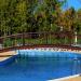 Pedestrian bridge over swimming pool