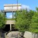 Сток воды с плотины в городе Сысерть