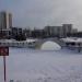 Пешеходный мост через Михайловский пруд в городе Москва