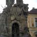 Statue of St. John of Matha, St. Felix of Valois, and St. Ivan in Prague city