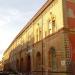 Old school building in decorated terracotta in Imola city