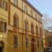 Building with terracotta decorated facade in Imola city