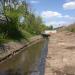 Открытый участок реки Нищенки в городе Москва